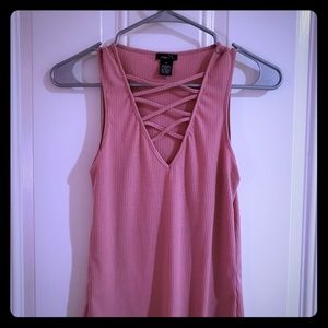 Sleeveless top with criss-cross strap V neck